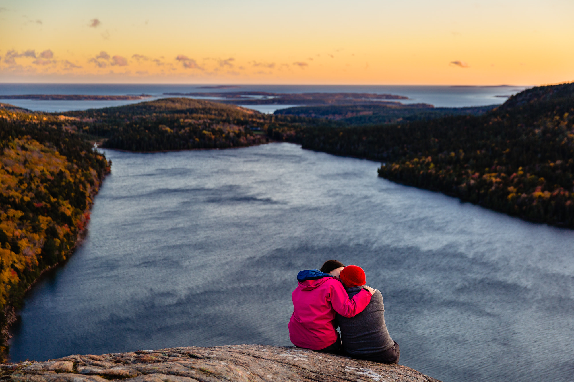 Sunset portraits on a mountaintop in Acadia National Park in Maine