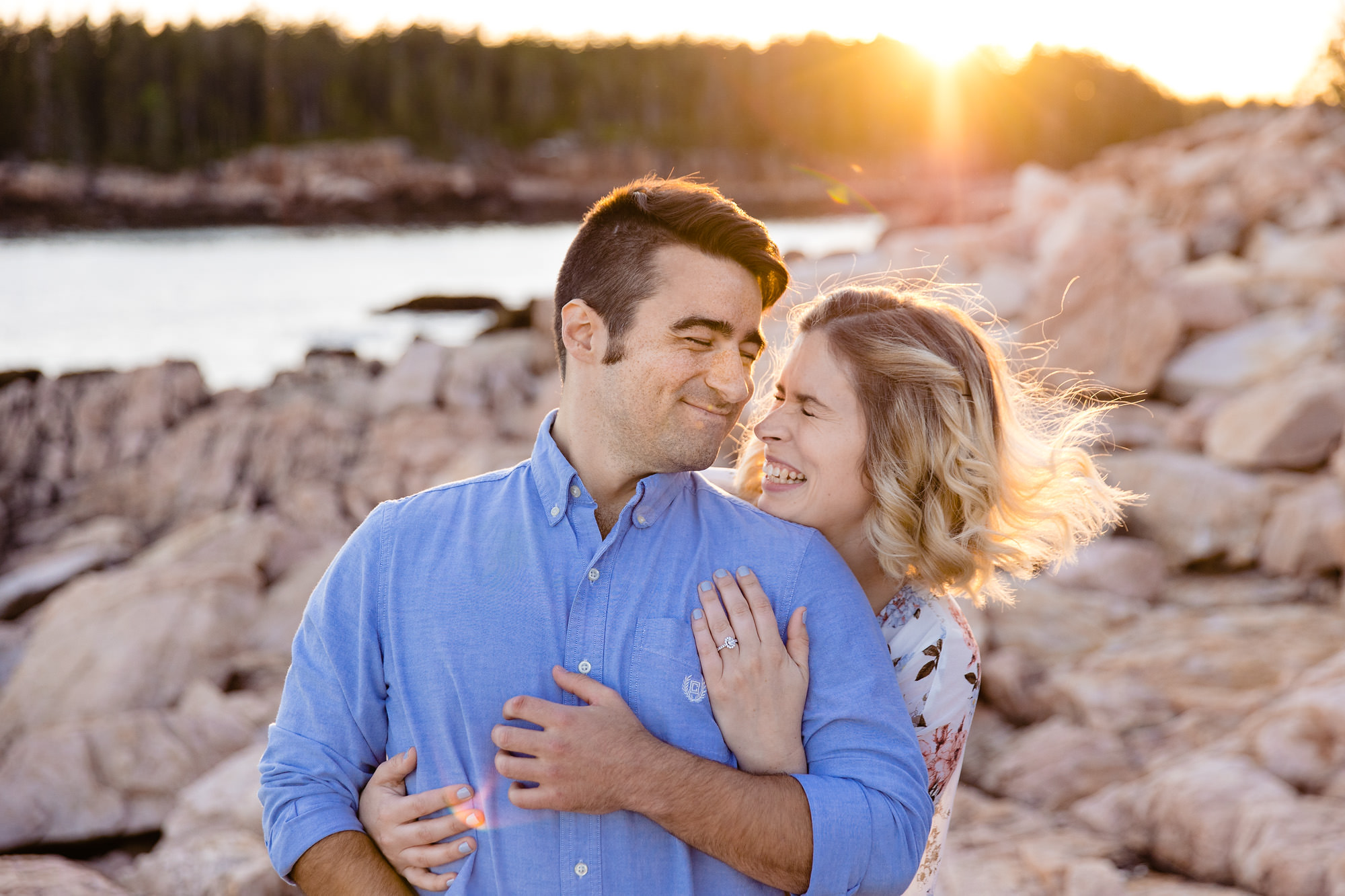 A couple does an easy hike in Acadia for their engagement session in Maine