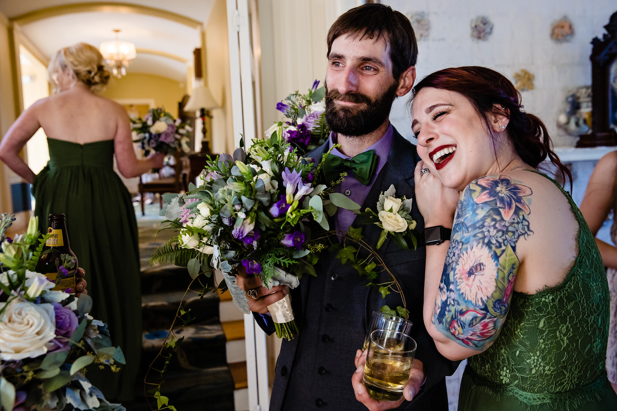 A groom gets emotional during cocktail hour.