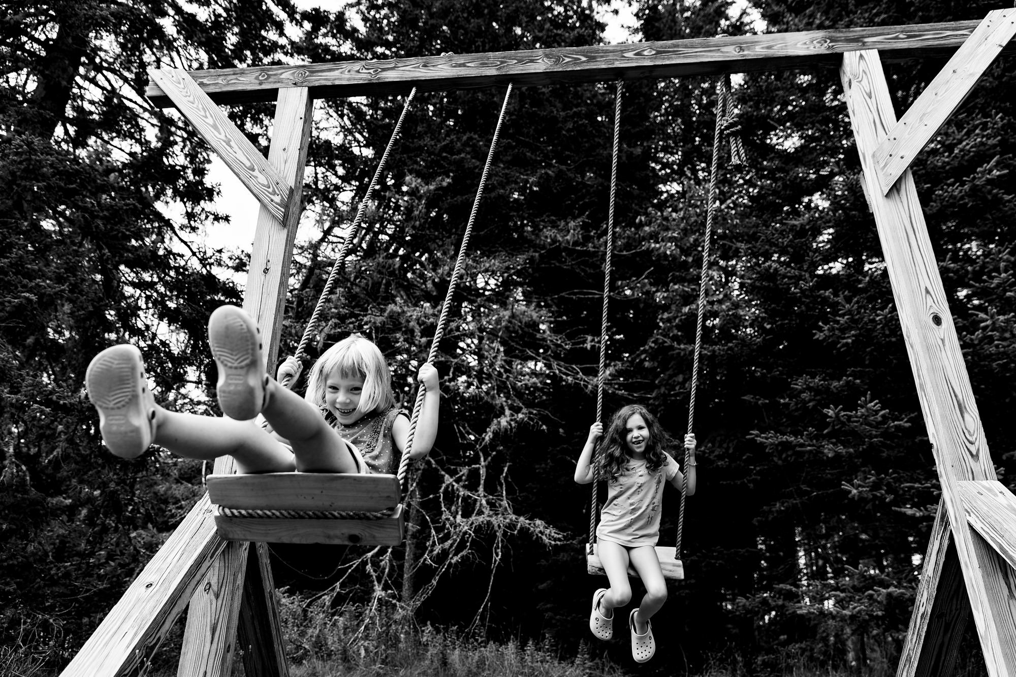 Flower girls play at a wedding in Tremont Maine on MDI