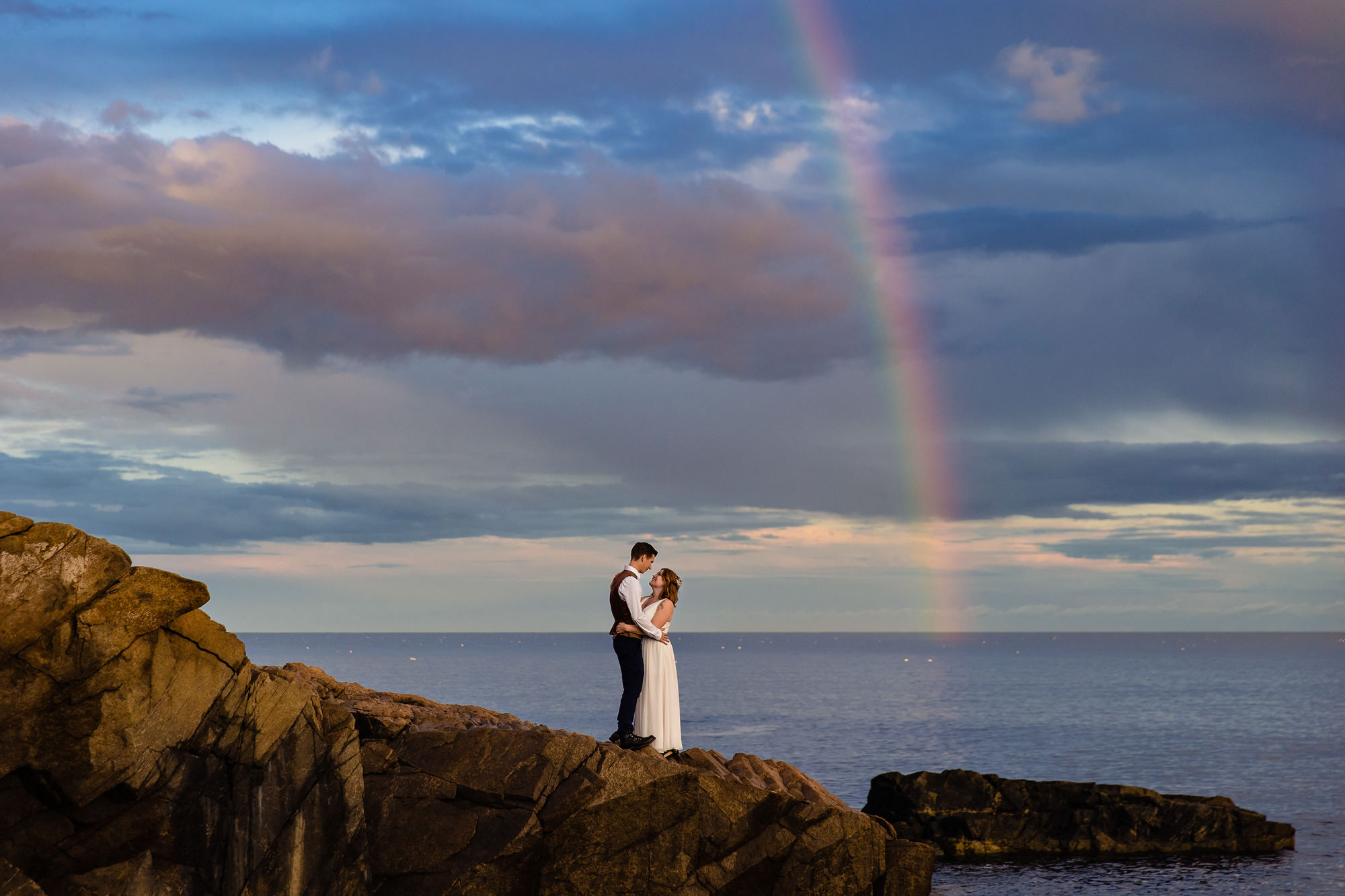 Dramatic landscape wedding portraits in Acadia National Park