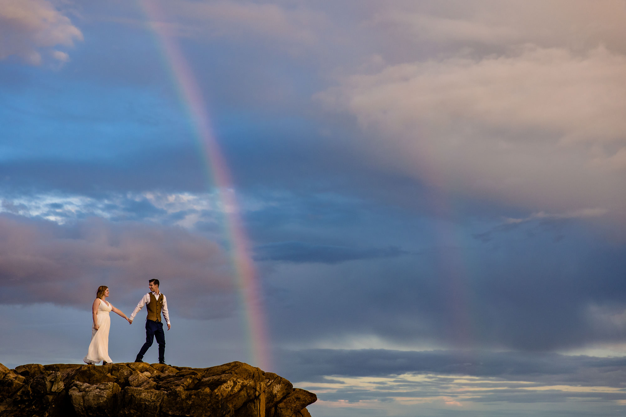 Dramatic landscape wedding portraits in Acadia National Park