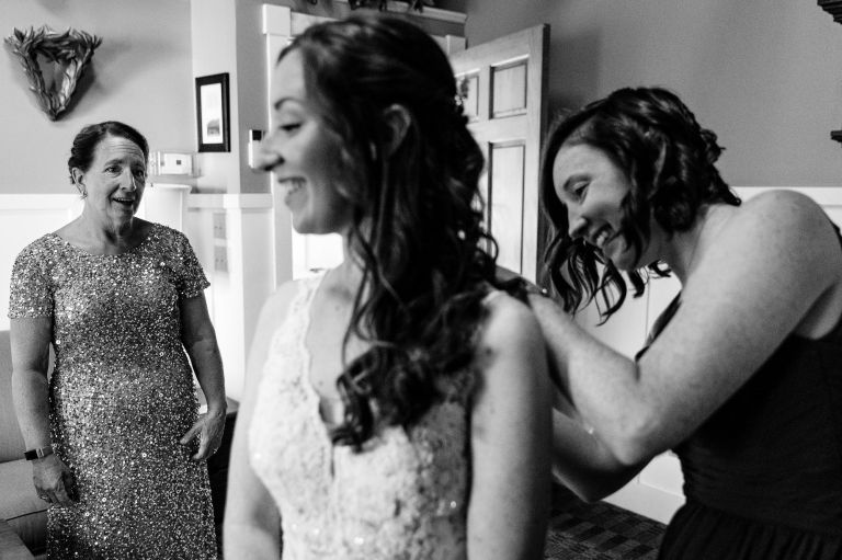 A bride gets ready for her wedding day at the Acadia Hotel in Bar Harbor, Maine