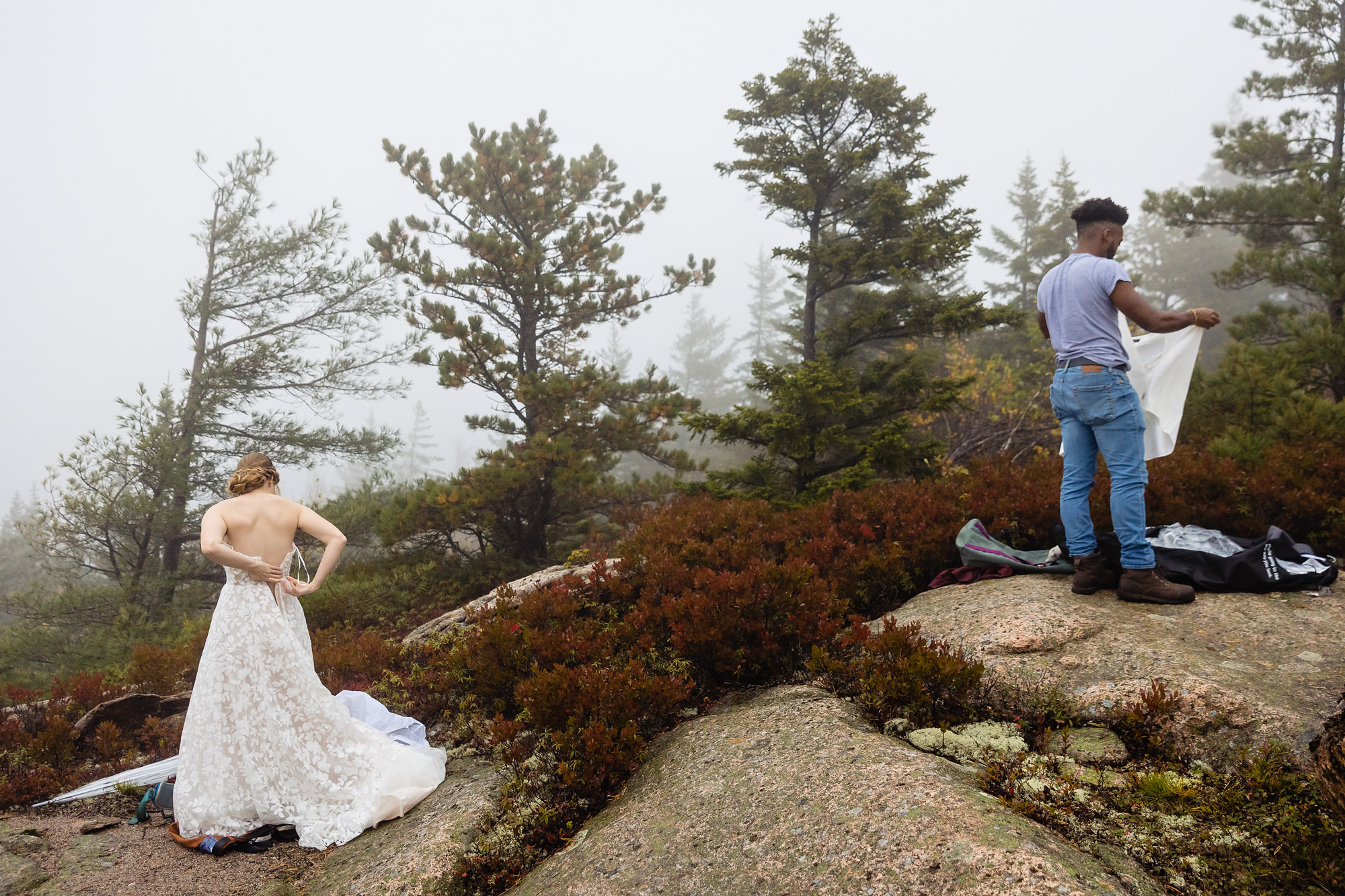 A couple changes on top of a mountain for their Acadia elopement
