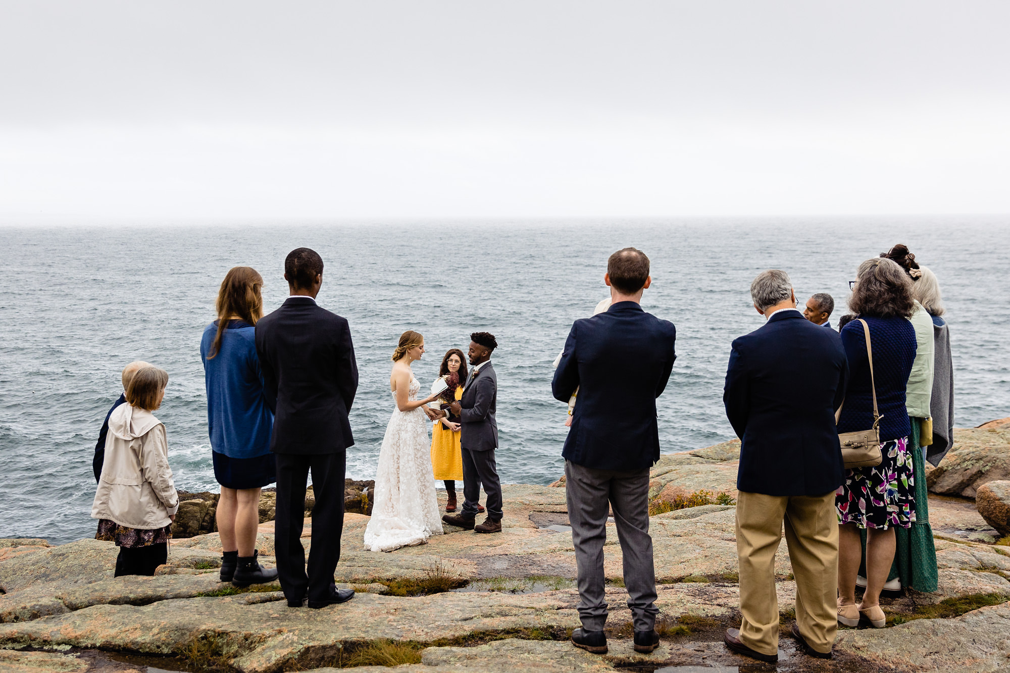 A wedding ceremony in Acadia National Park on a foggy day
