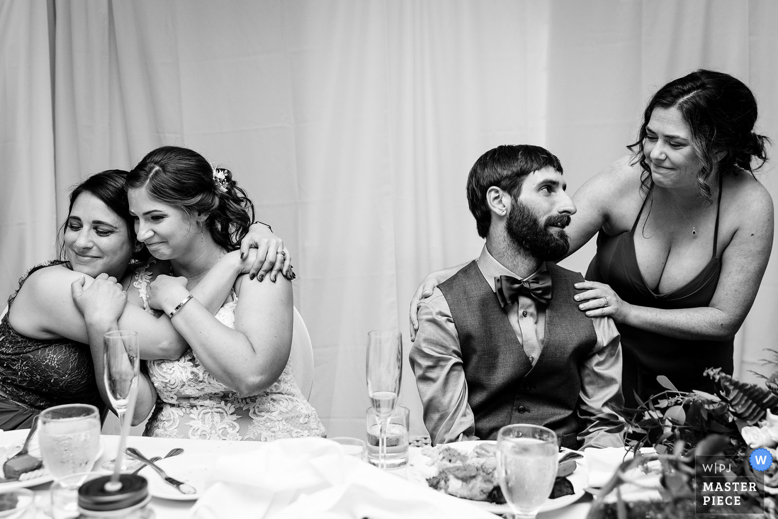 Lots of hugs are shared during a Bar Harbor wedding