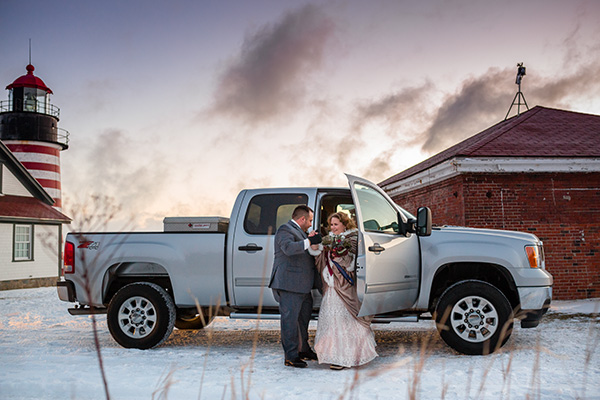 A winter elopement portrait in Lubec Maine