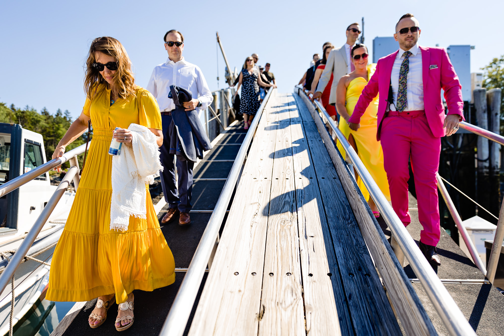 Guests walk down the ramp at Northeast Harbor Marina to board the Sea Princess