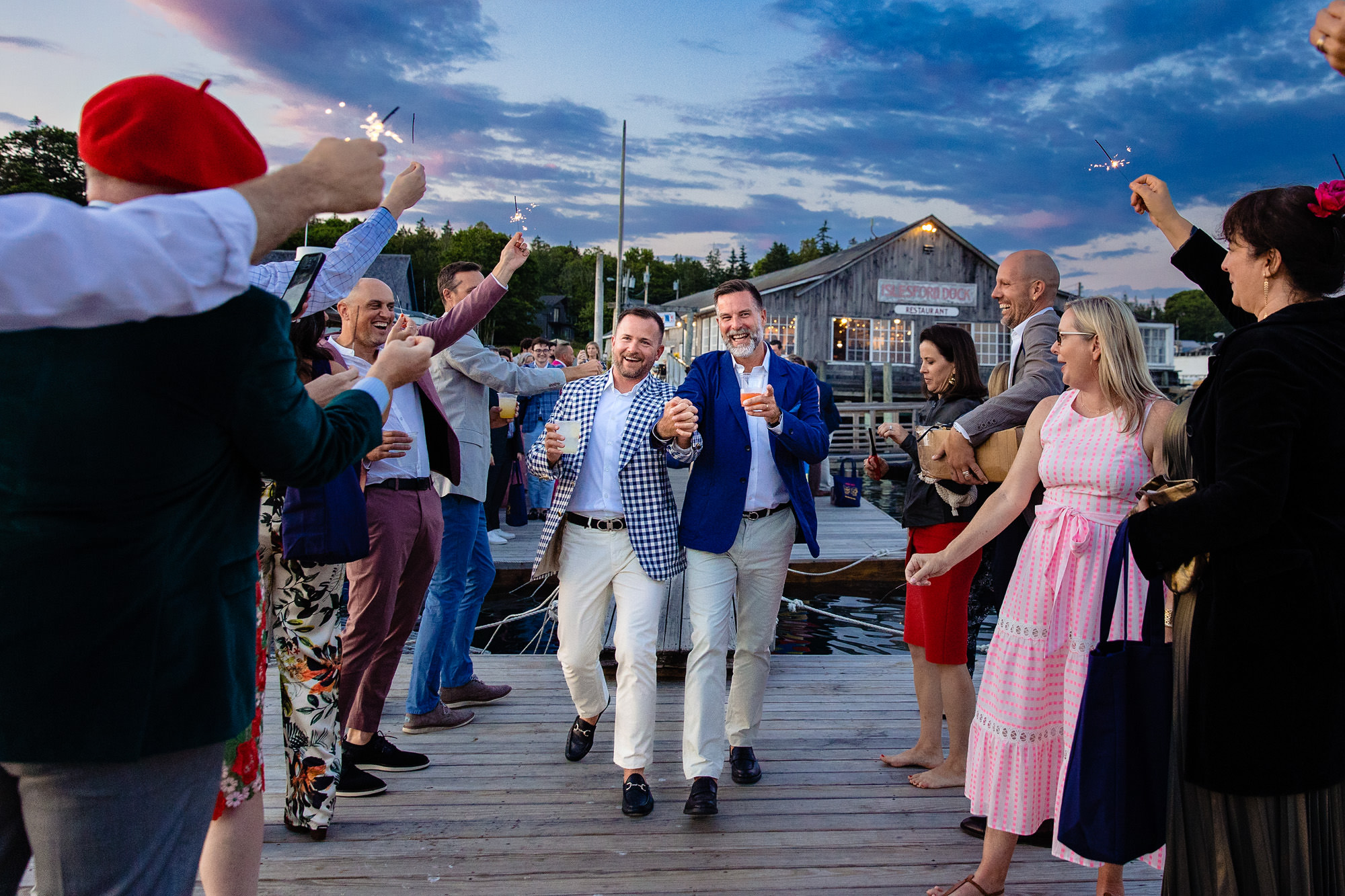 Ames and Lance leave Islesford via a sparkler exit at their wedding