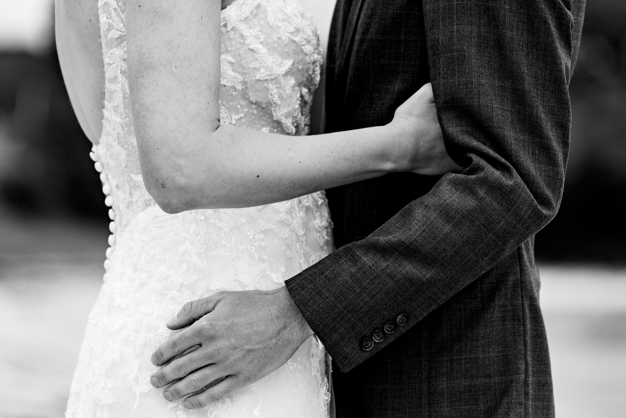 A stunning first look prior to a wedding on a beach on Chebeague Island, Maine