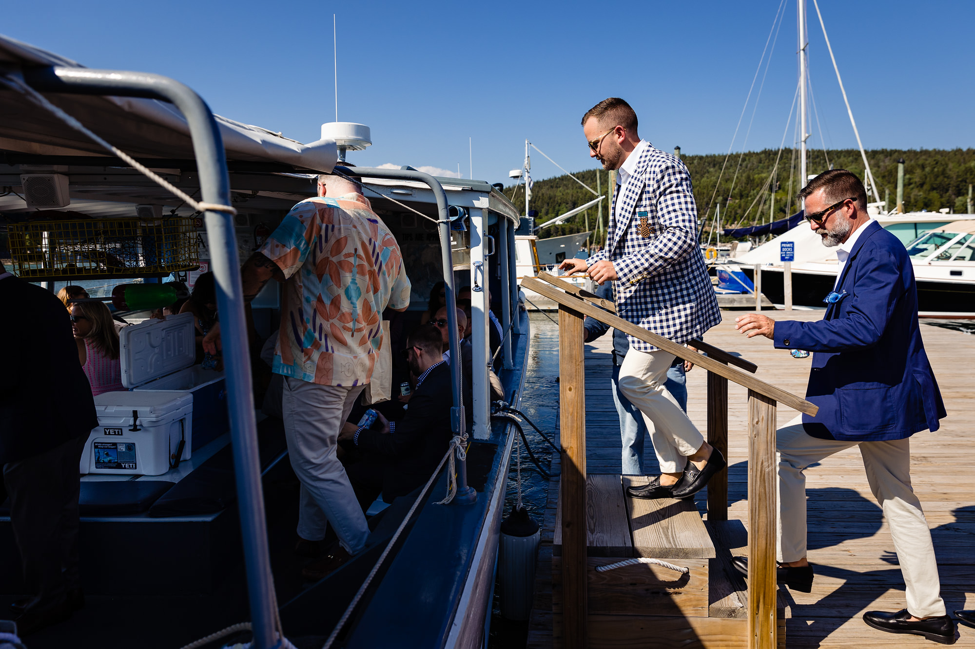 Guests walk down the ramp at Northeast Harbor Marina to board the Sea Princess