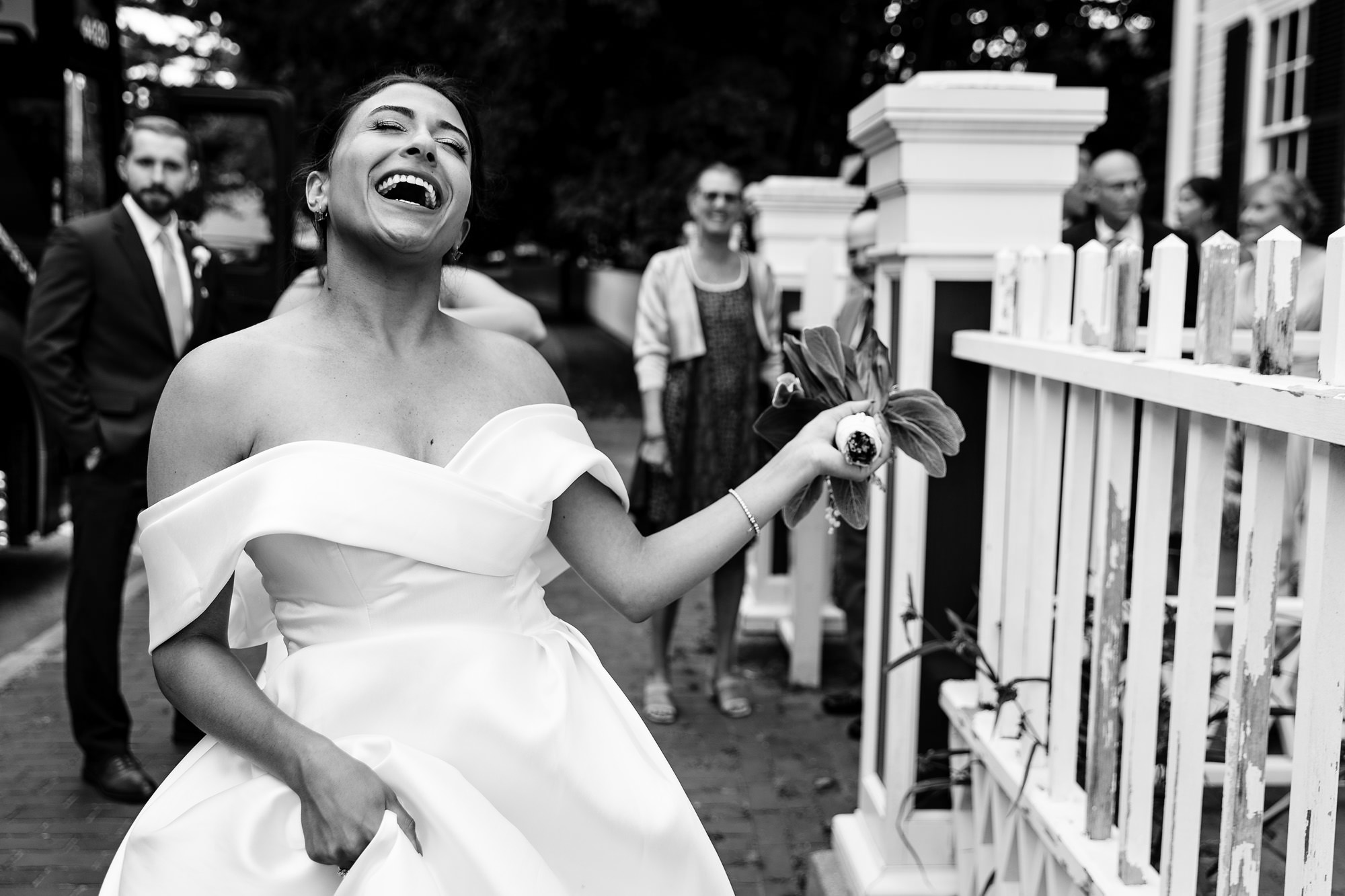 A bride is overjoyed after her wedding ceremony at Strawbery Banke Museum