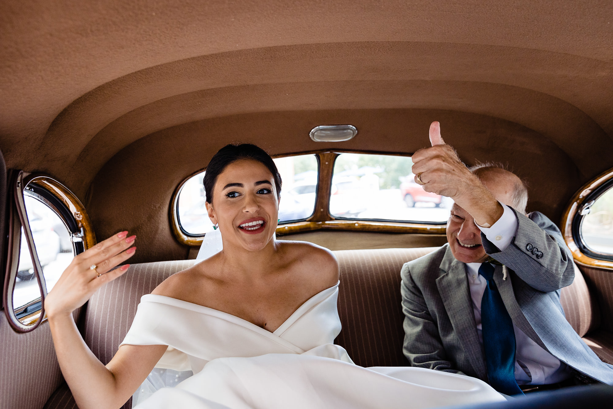 A bride and her father drive to her wedding ceremony at Strawbery Banke Museum in Portsmouth, NH