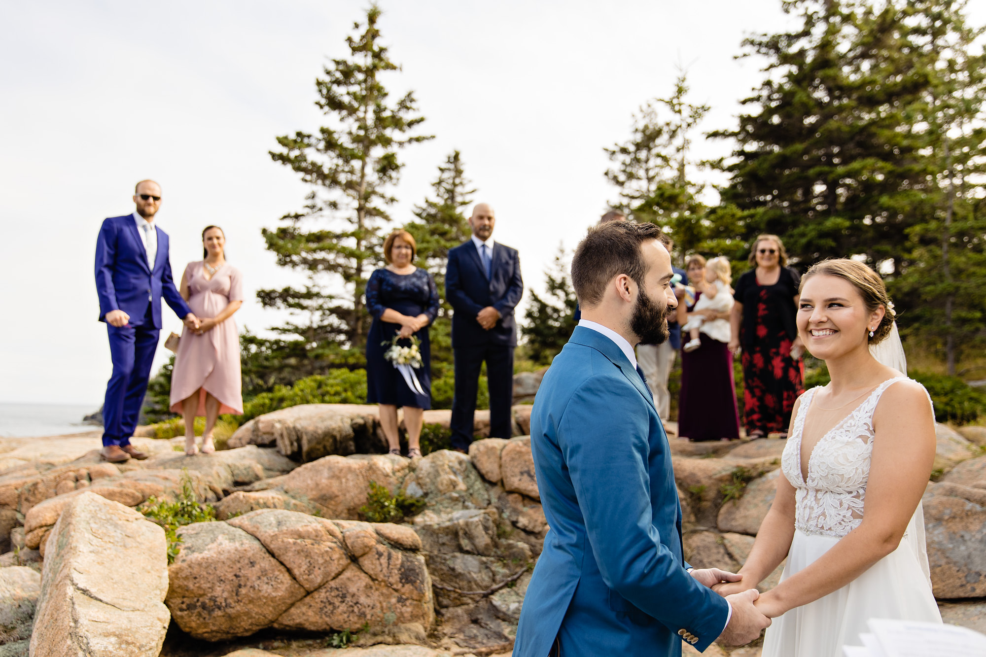 An Acadia National Parkelopement ceremony taking place on the cliffs in Maine