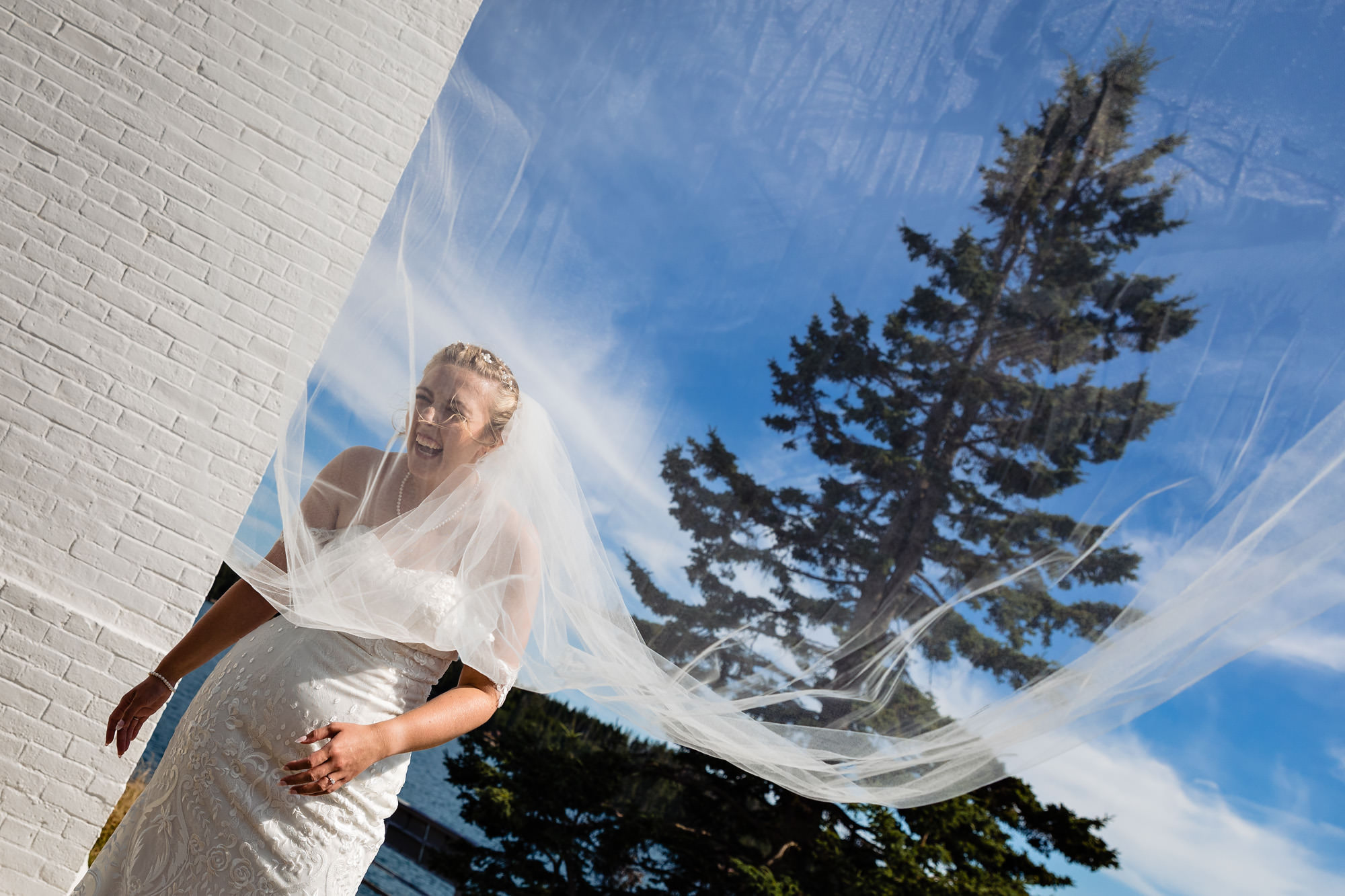 Wedding portraits taken at Burnt Coat Lighthouse on Swans Island, Maine