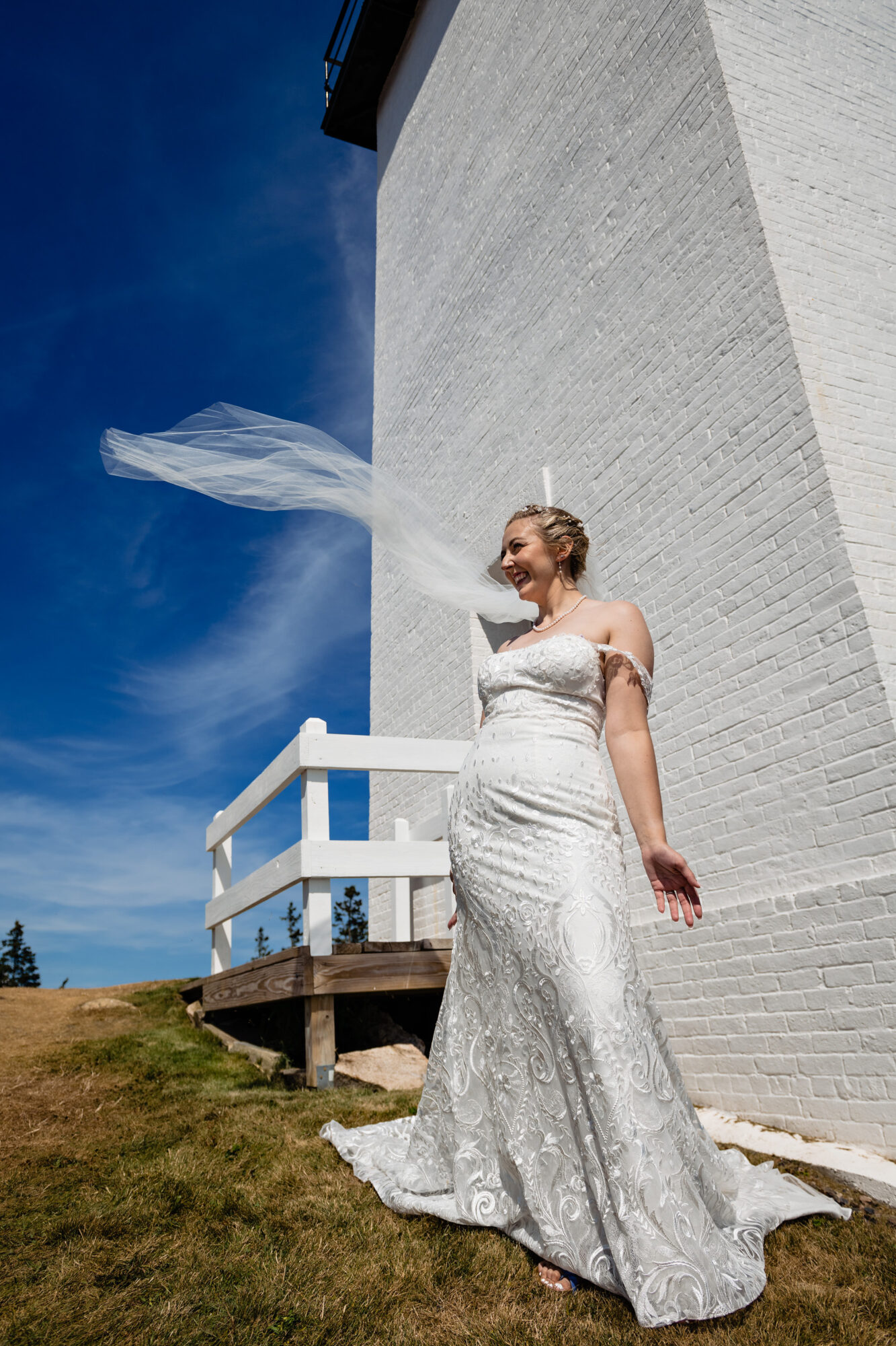 Wedding portraits taken at Burnt Coat Lighthouse on Swans Island, Maine