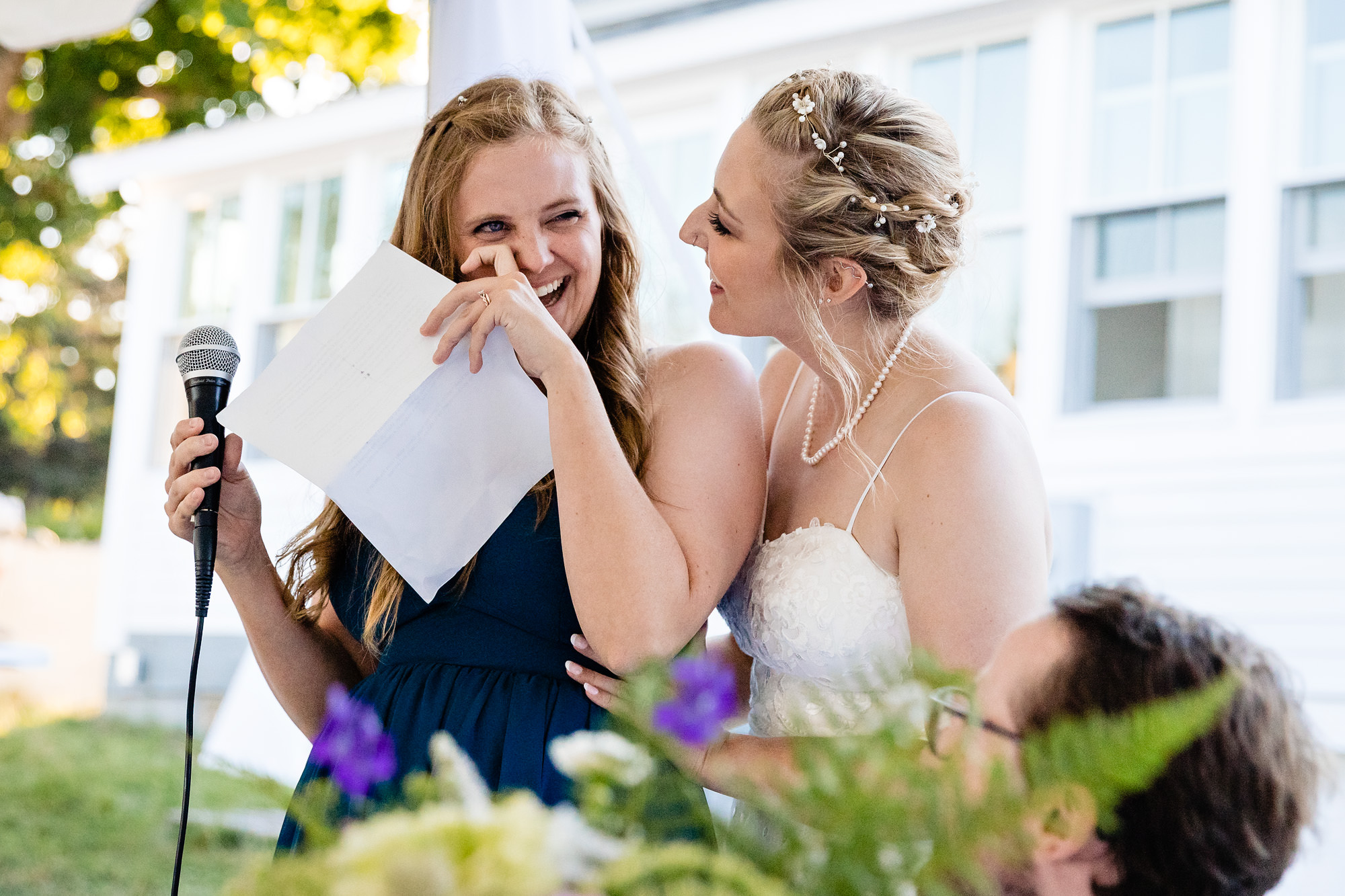 Emotional wedding toasts at a wedding on Swan's Island, Maine