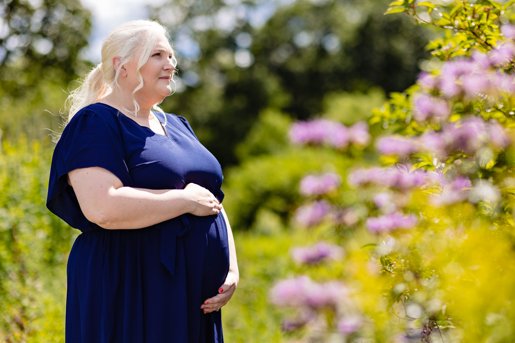 Maternity portraits taken at the Children's Garden at Fort Williams