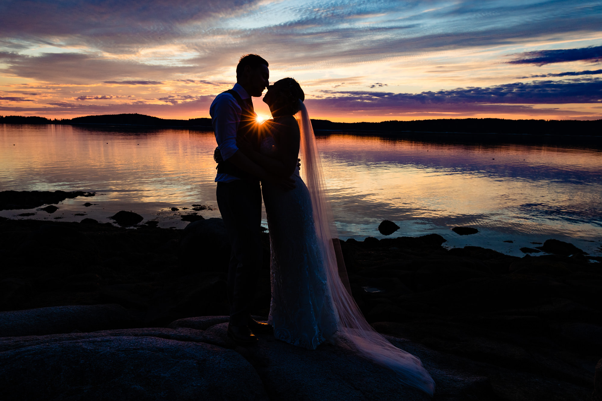 Sunset wedding portraits on an island in Maine