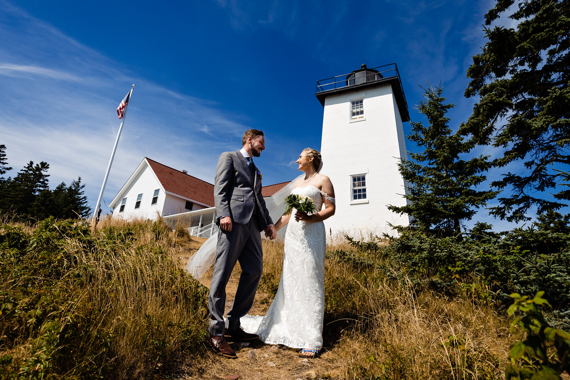 Wedding portraits taken at Burnt Coat Lighthouse on Swans Island, Maine