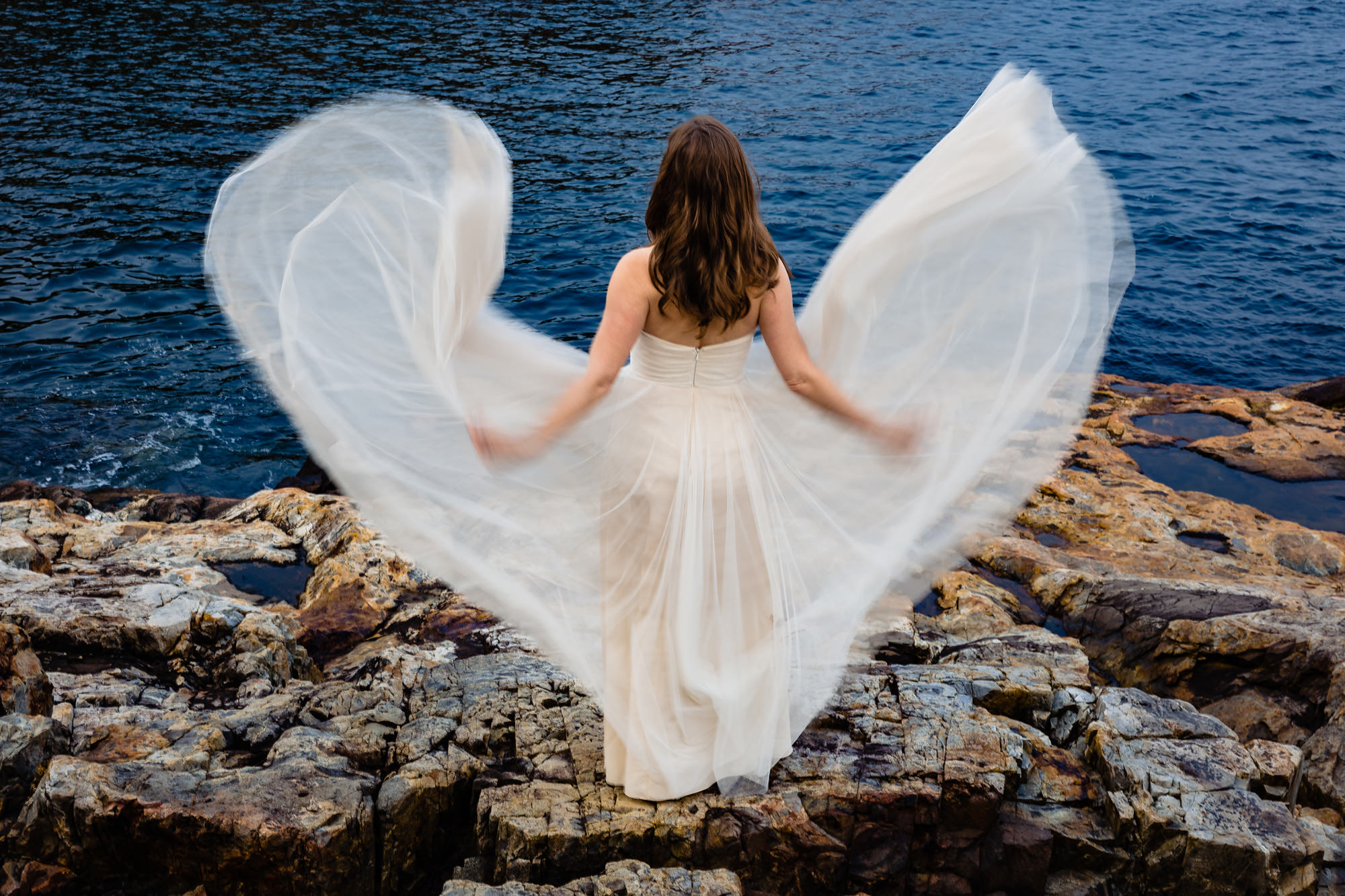 A unique bridal portrait taken at Acadia National Park during an elopement