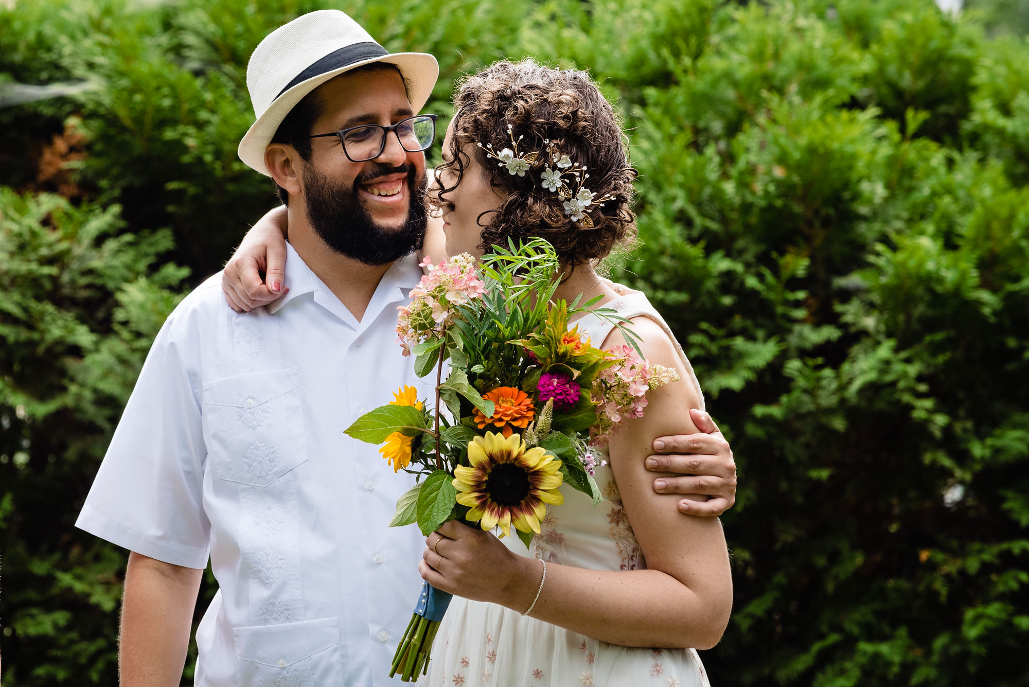 The bride and groom share a moment before their Camden Amphitheater wedding.