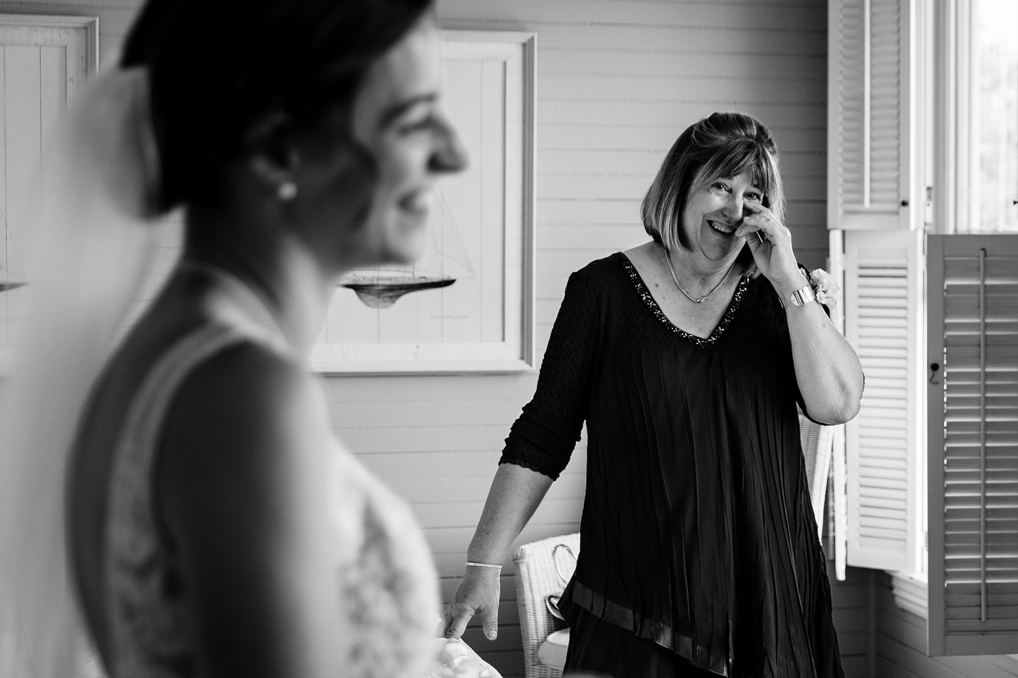 A groom gets dressed for his wedding in Georgetown Maine