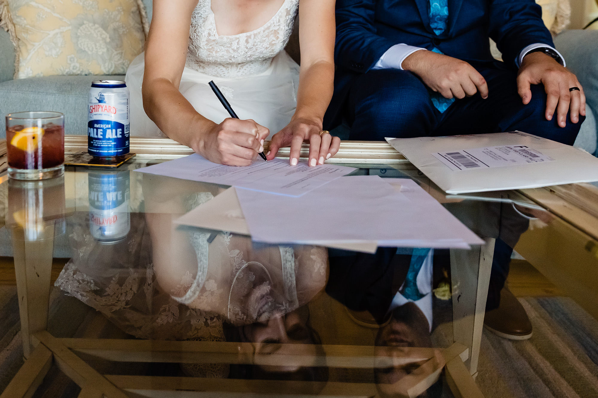 Signing of the paperwork after the wedding ceremony in coastal Maine