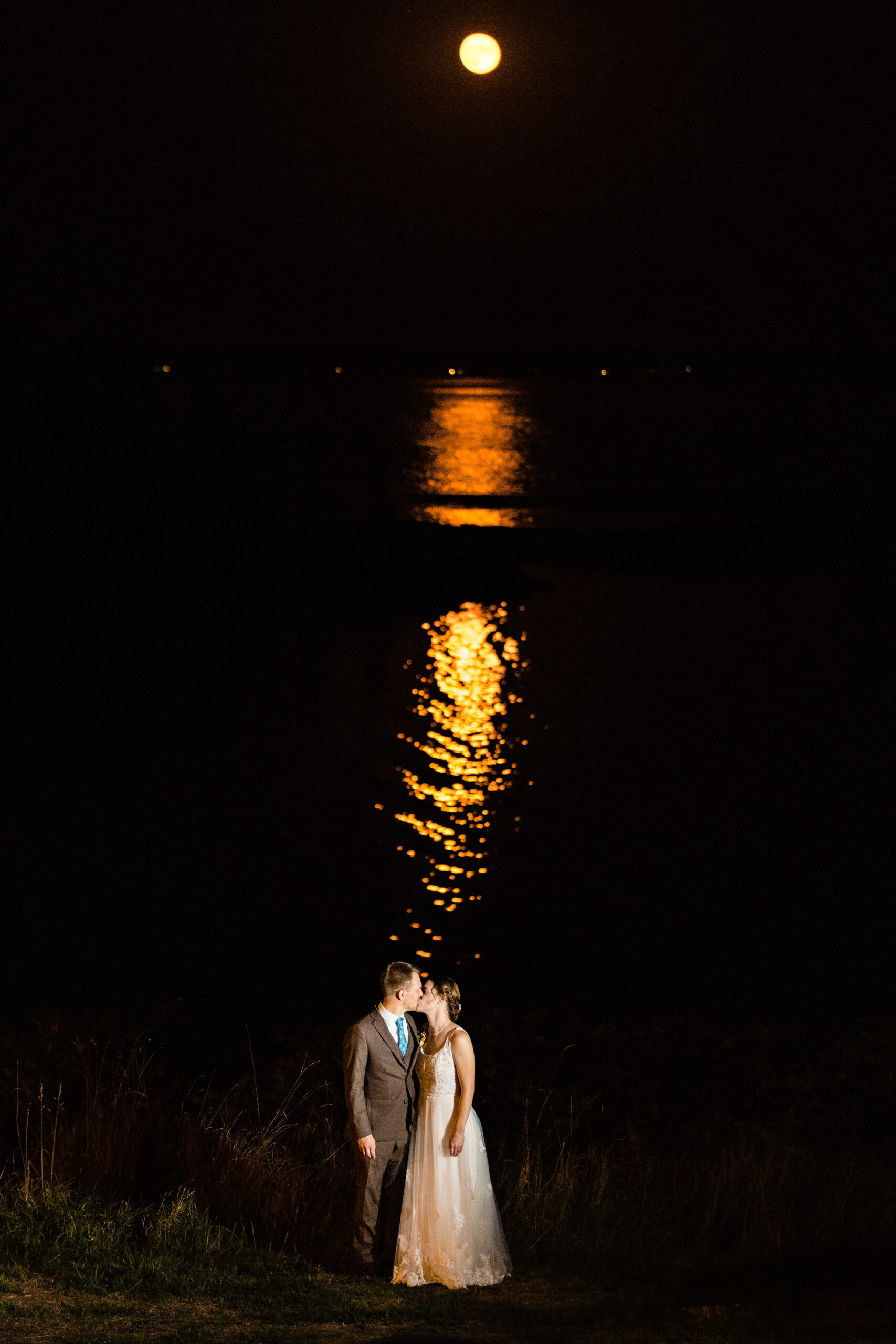 A wedding portrait under the harvest moon in Georgetown, Maine
