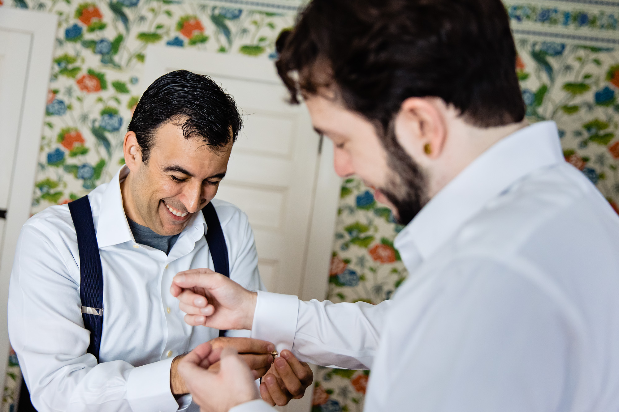 Two grooms get ready for their wedding at the Harbourside Inn in Northeast Harbor, Maine