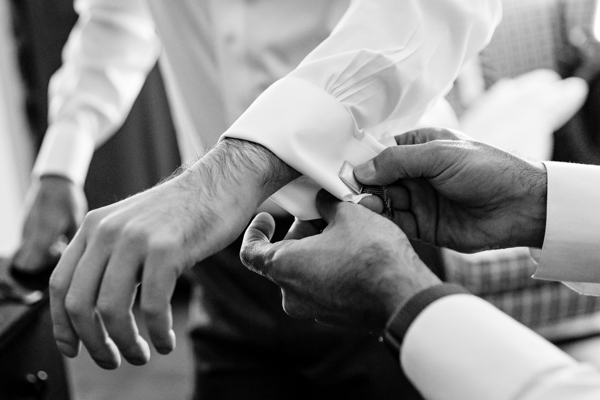 Two grooms get ready for their wedding at the Harbourside Inn in Northeast Harbor, Maine