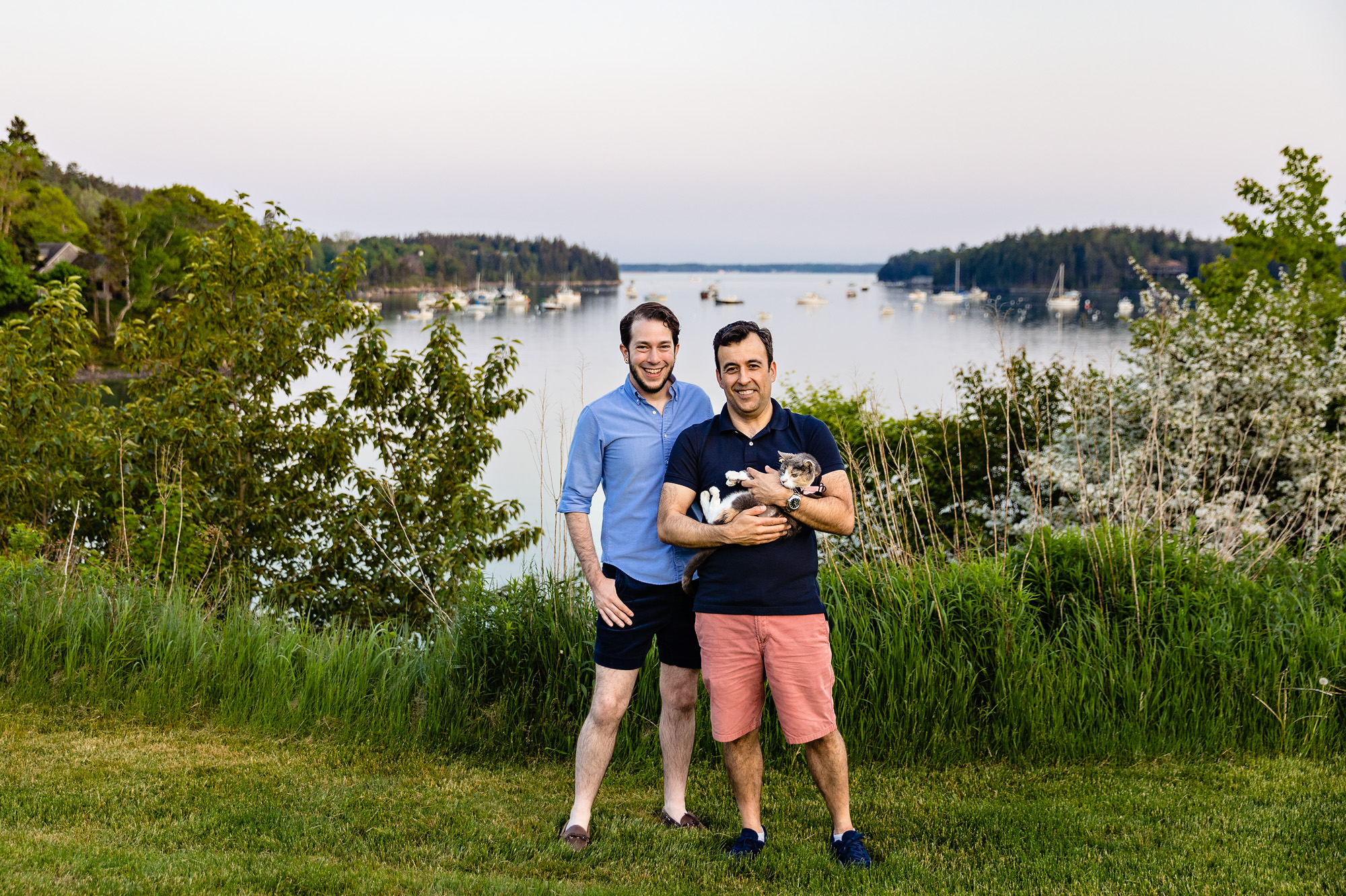 A couple poses with their cat at the Asticou Inn in Northeast Harbor, Maine.