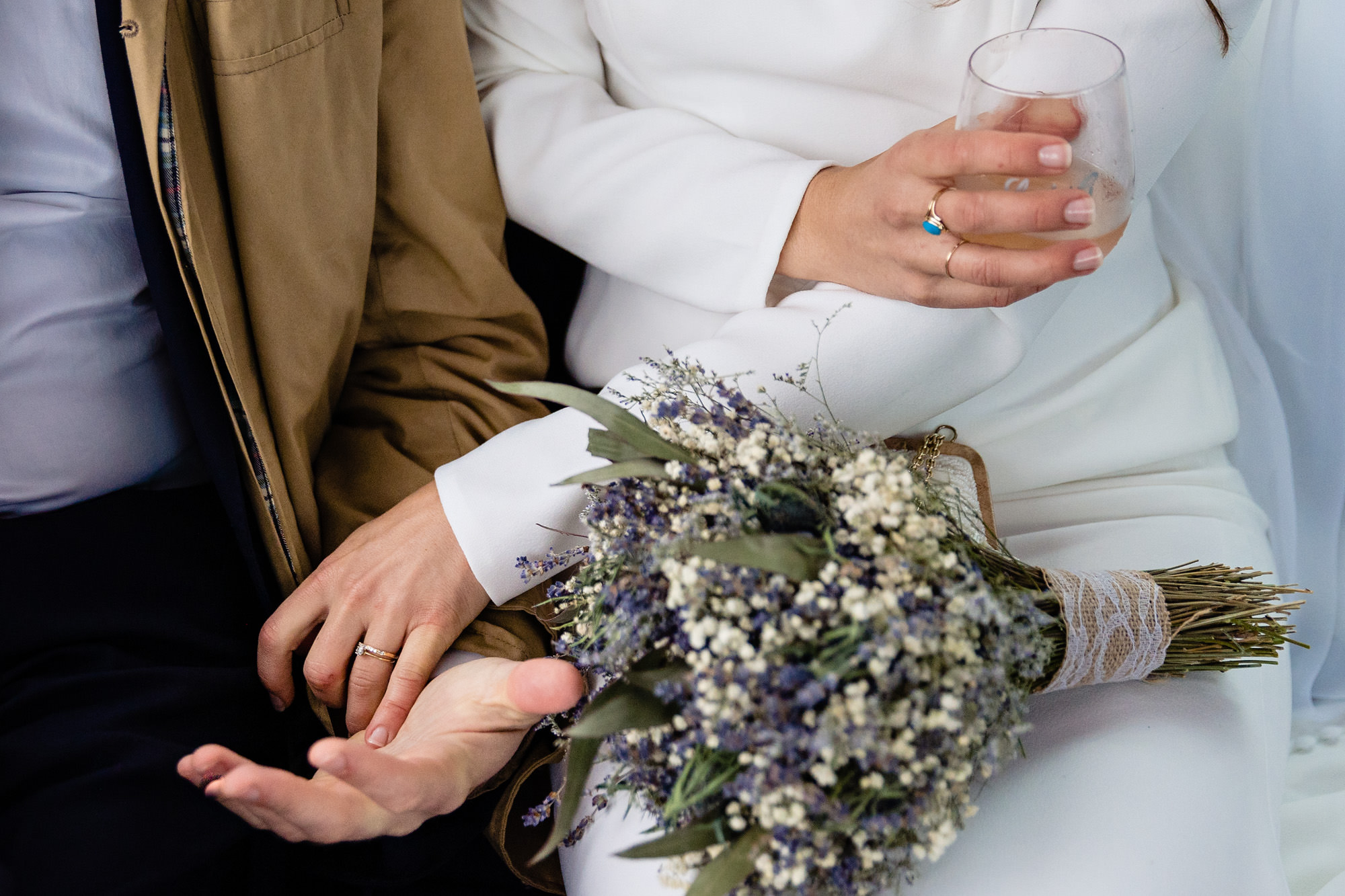 An intimate hand hold at a wedding in Boothbay Harbor, Maine