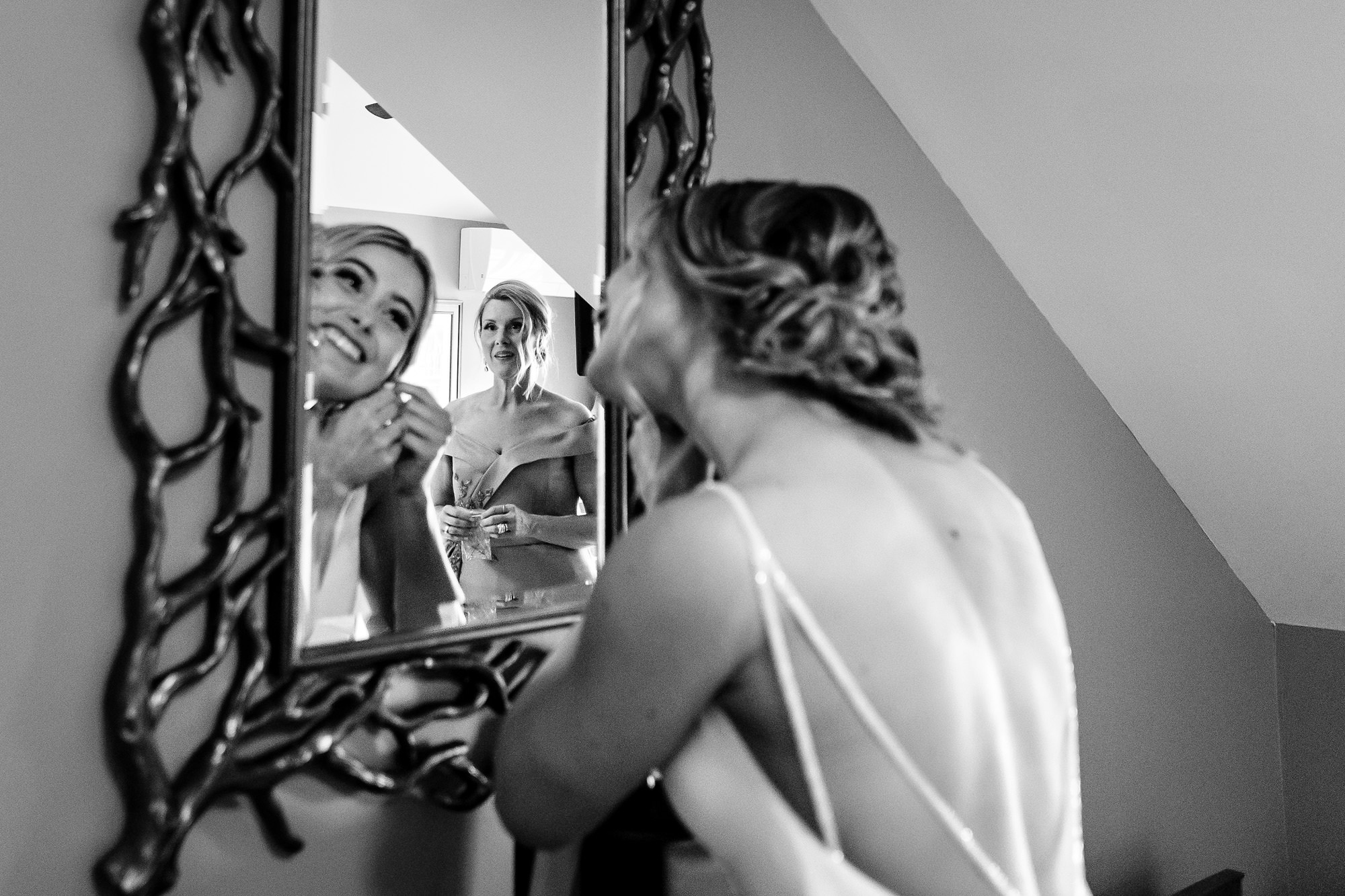 A bride prepares and gets dressed for her Bar Harbor Inn wedding.