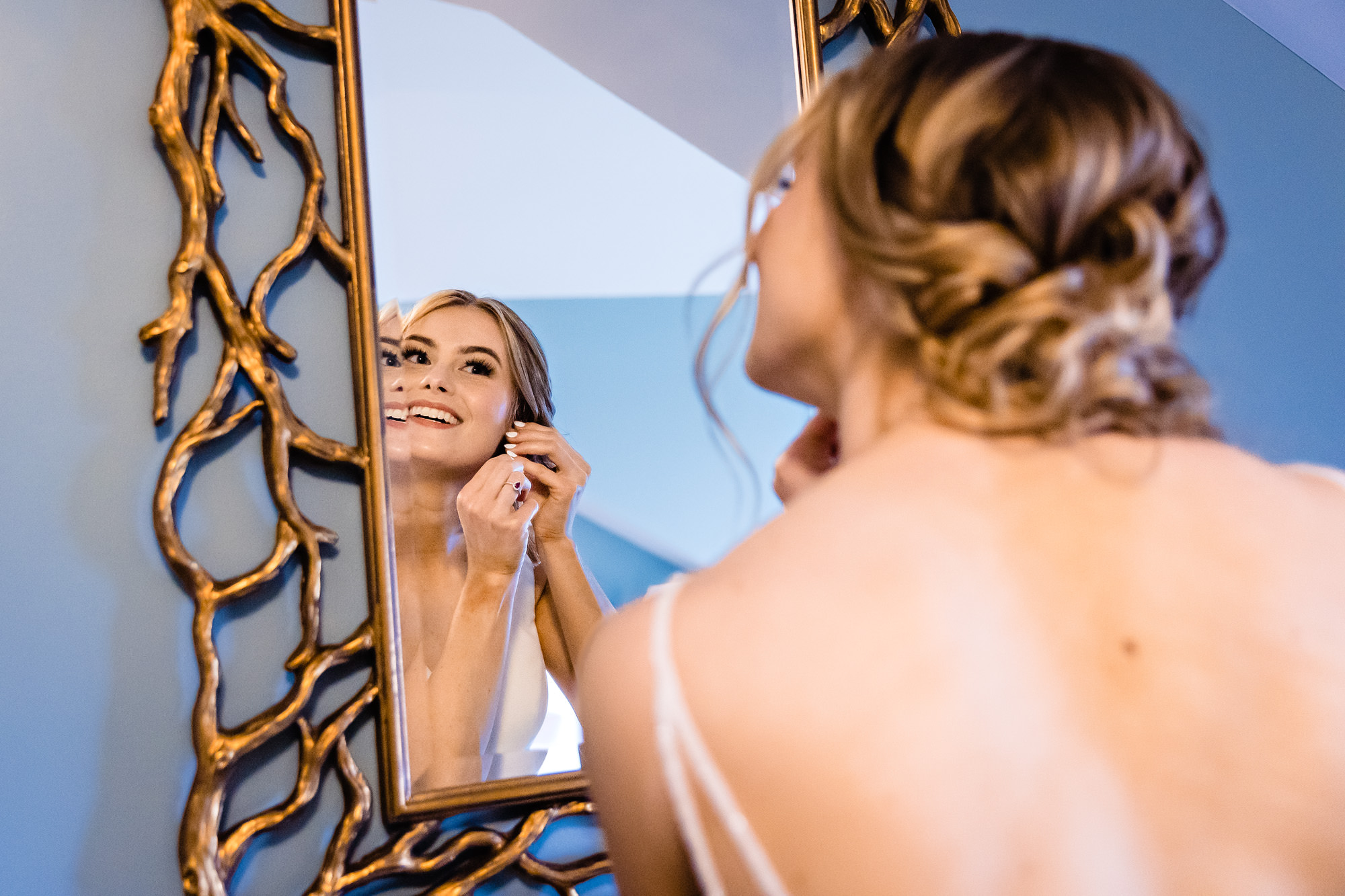 A bride prepares and gets dressed for her Bar Harbor Inn wedding.
