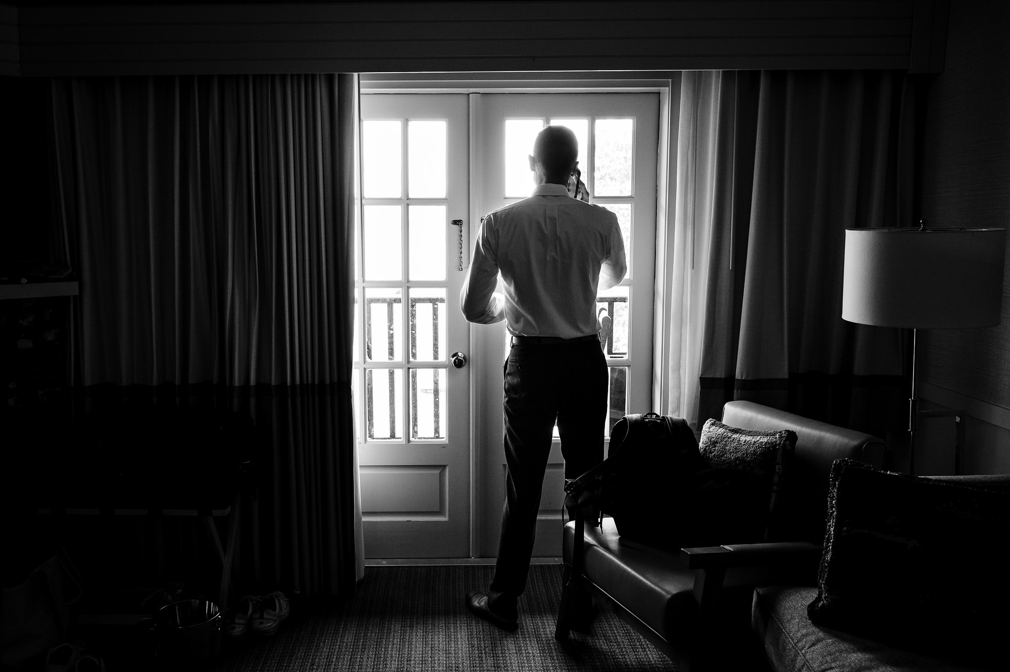 A groom gets ready for his wedding day at Mills Falls at Church Landing