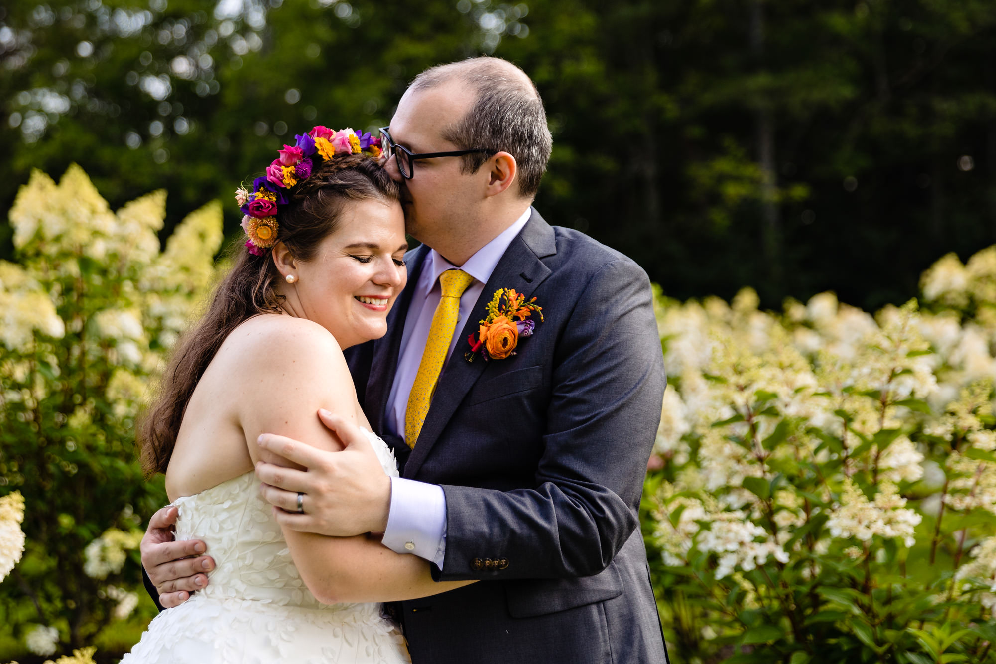 Wedding portraits in a garden at sunset in midcoast Maine