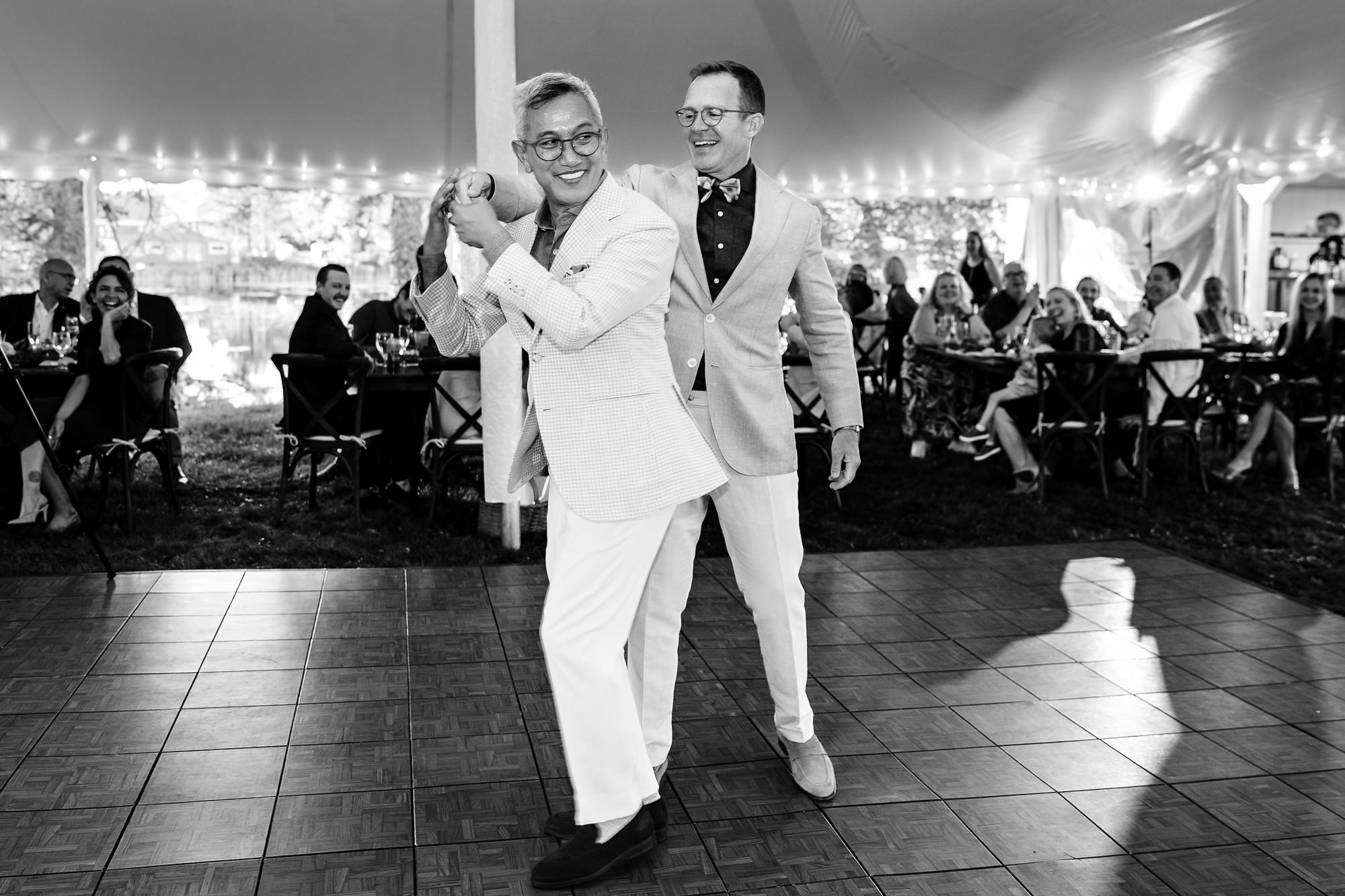 The wedding couple share a first dance at their Rangeley Maine wedding