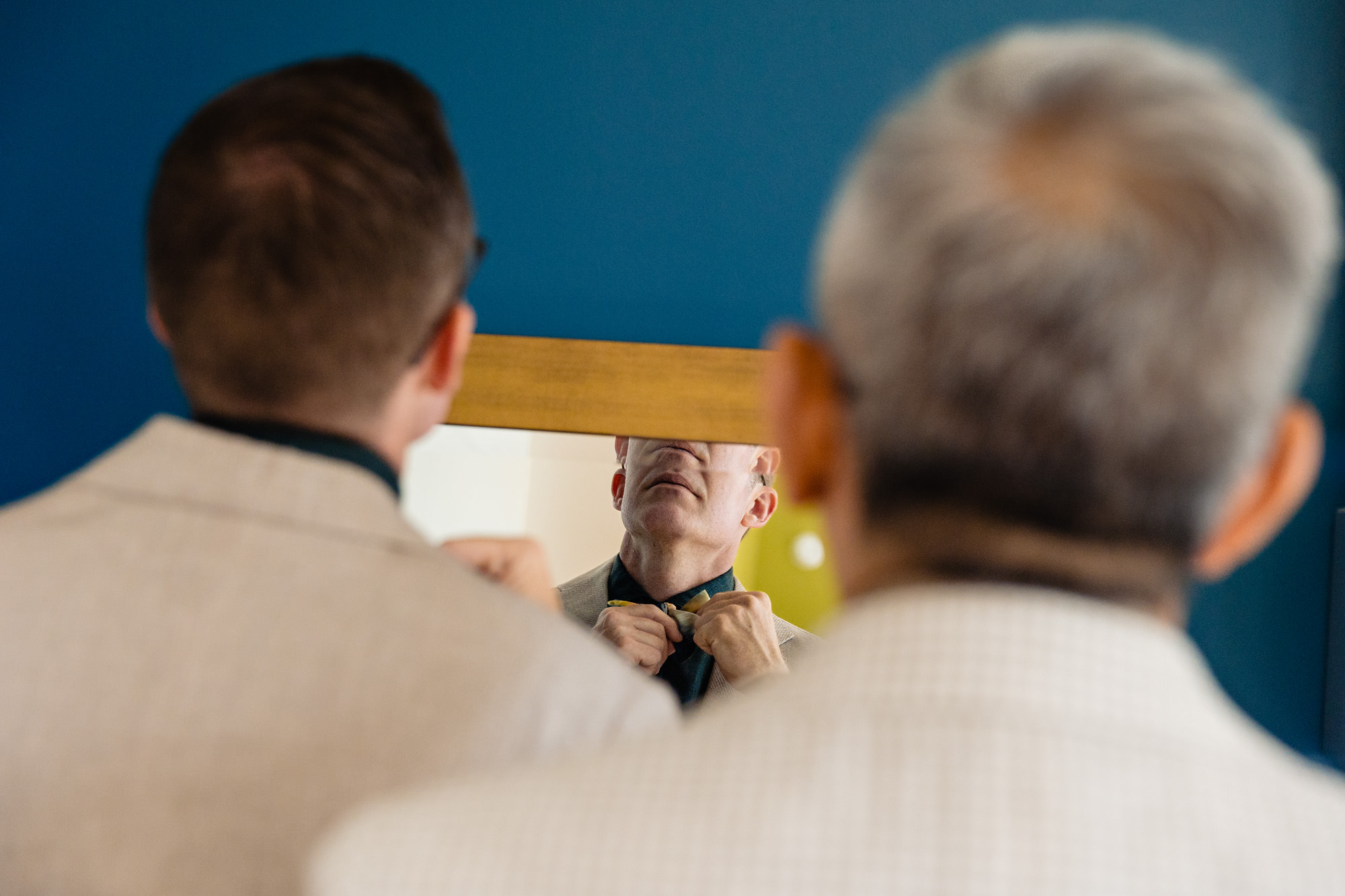 The grooms get ready at a Rangeley Maine wedding