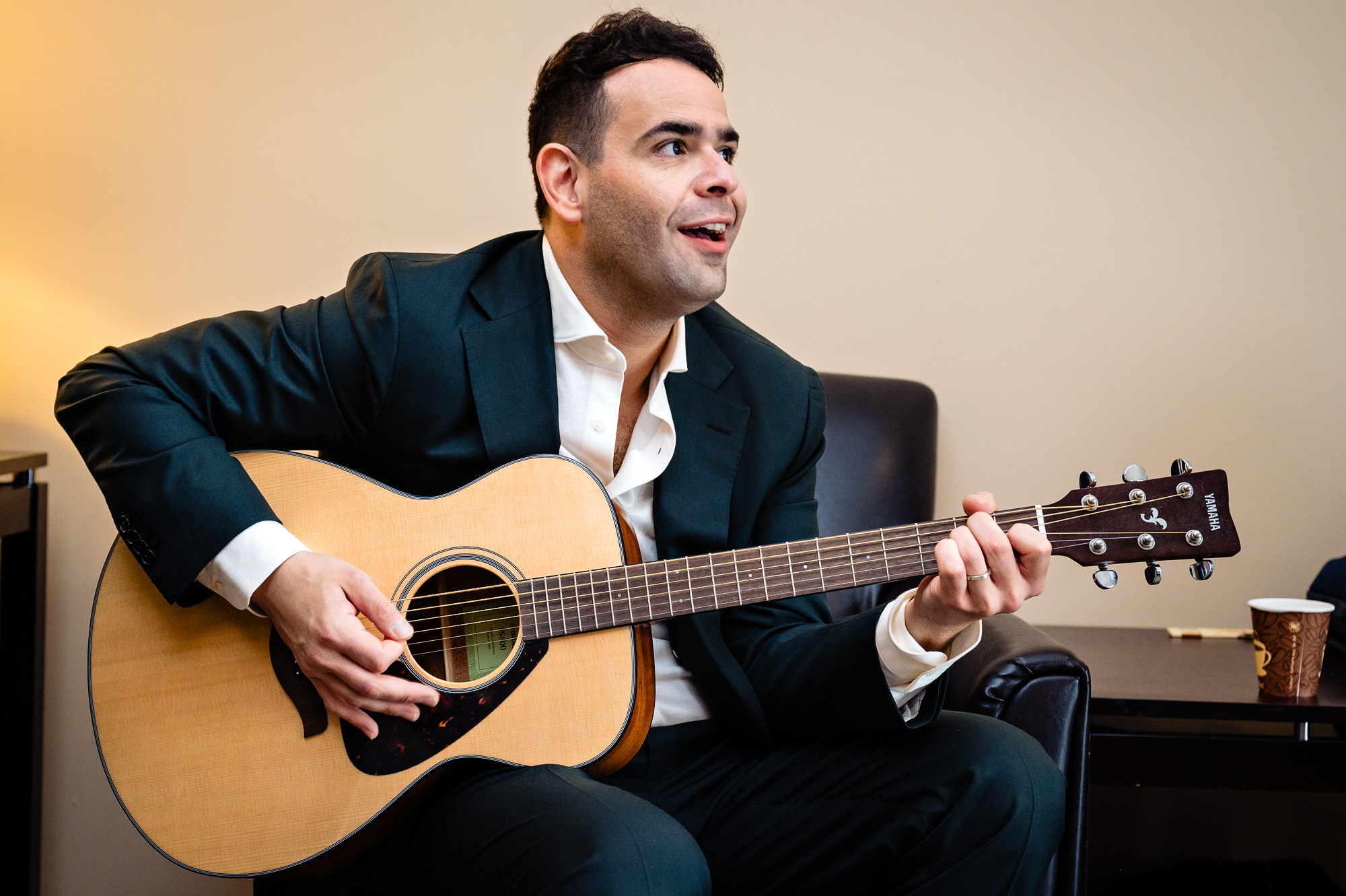 The groom jammed with his wedding party at his Maine wedding