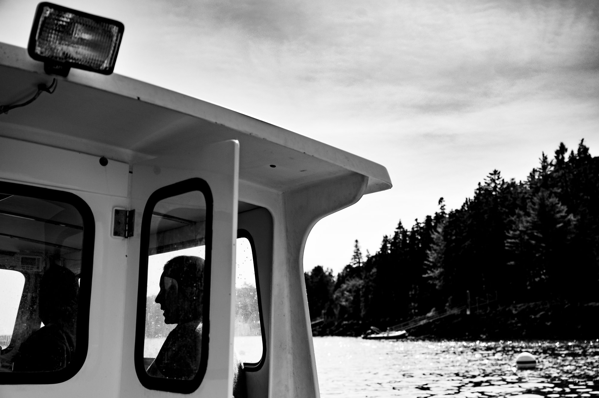 The bride takes a ferry to Little Cranberry Island for her wedding.