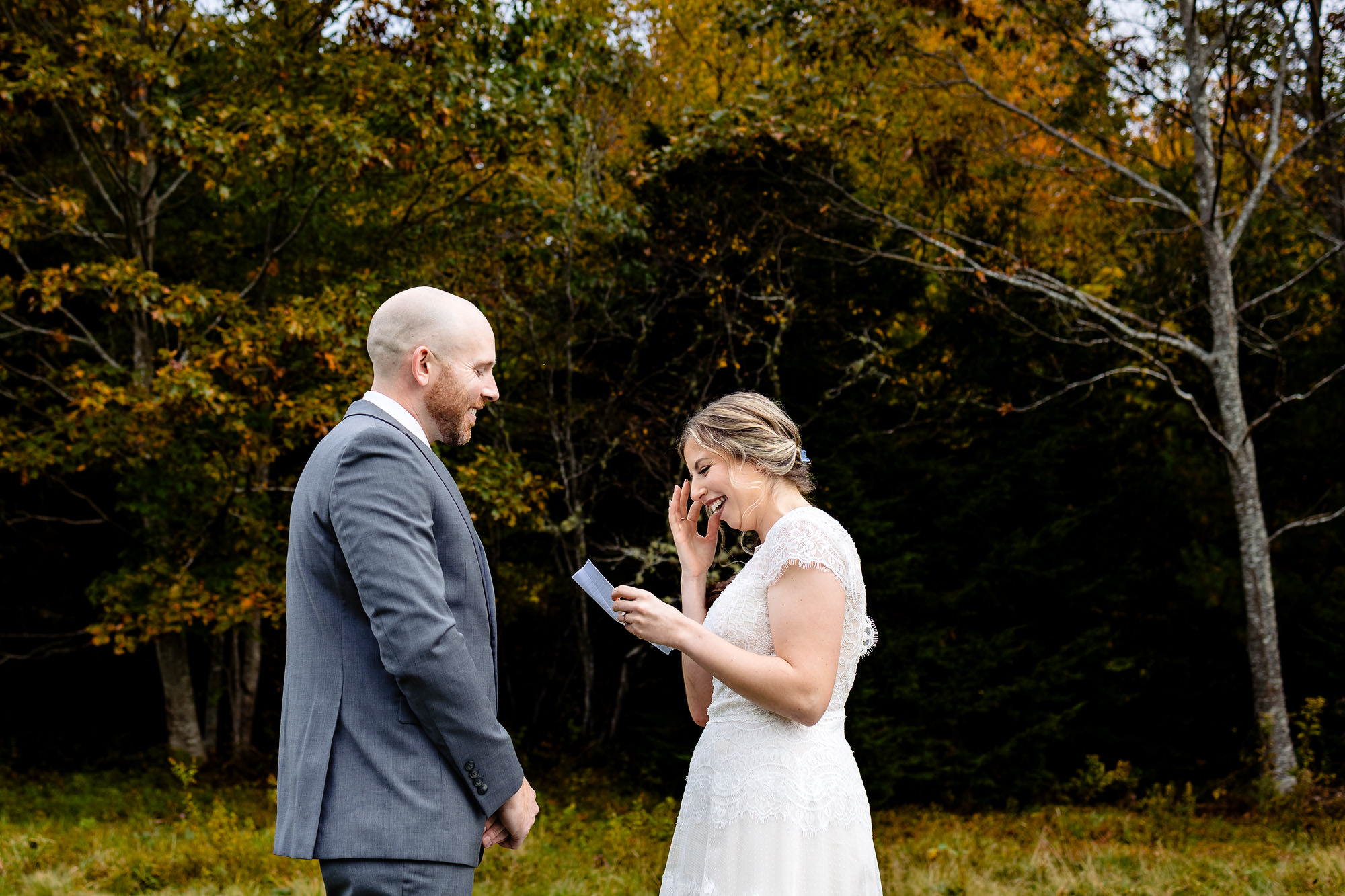 An Acadia elopement where the couple reads their vows to one another