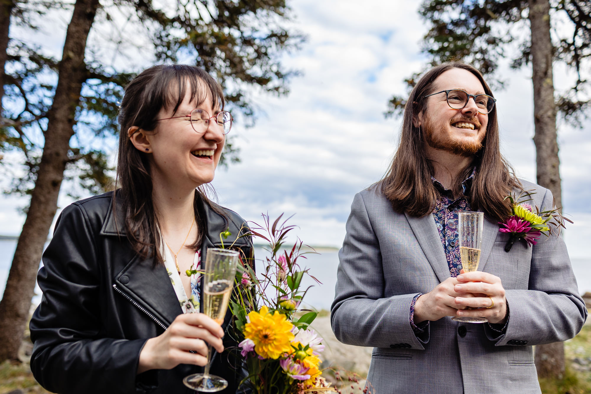 A champagne toast after an elopement ceremony at Seawall in Acadia